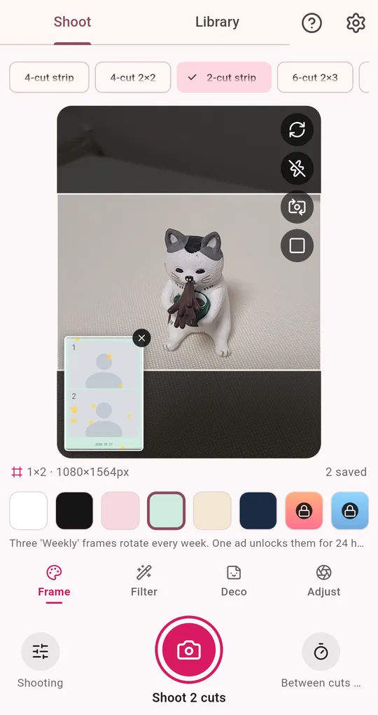 Shoot screen with the saved area marked by a white border, the shutter button and the interval button