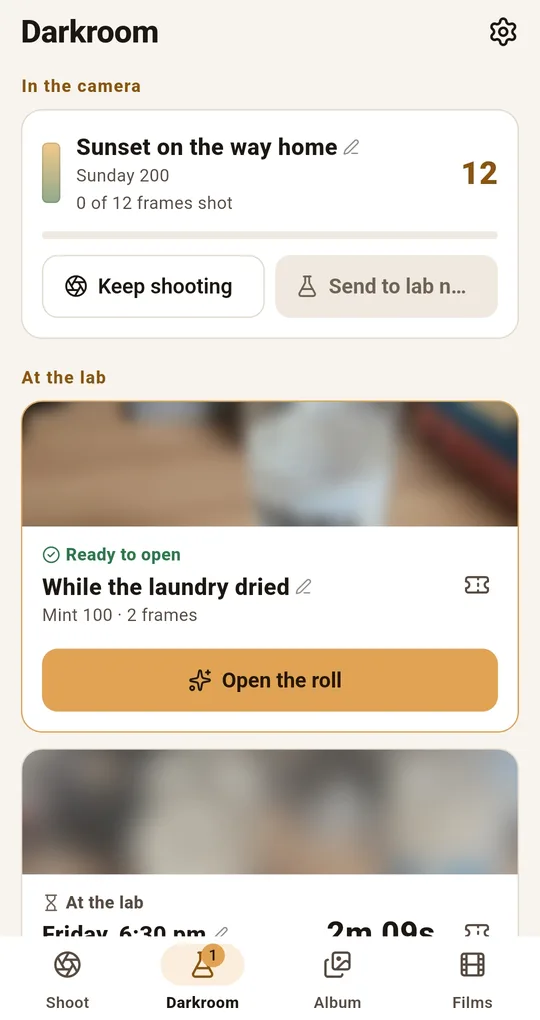 Darkroom tab with separate sections for rolls in the camera, rolls at the lab and rolls ready to open