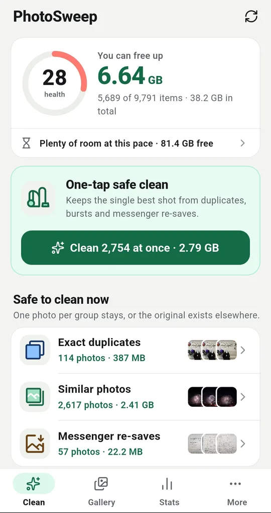 PhotoSweep home screen with the health score, how much can be freed, the one-tap safe clean button and the category list
