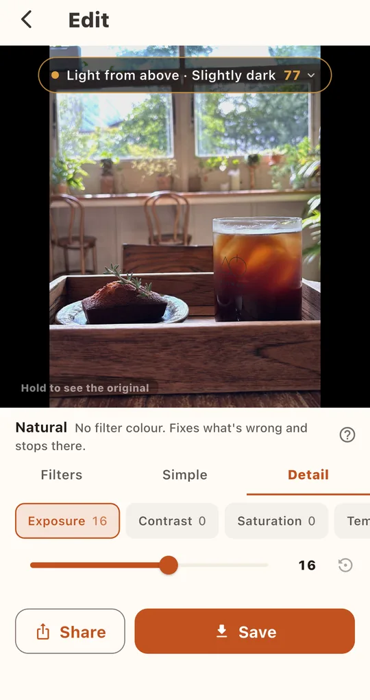 Detail tab with Exposure, Contrast, Saturation and Temperature controls and a slider